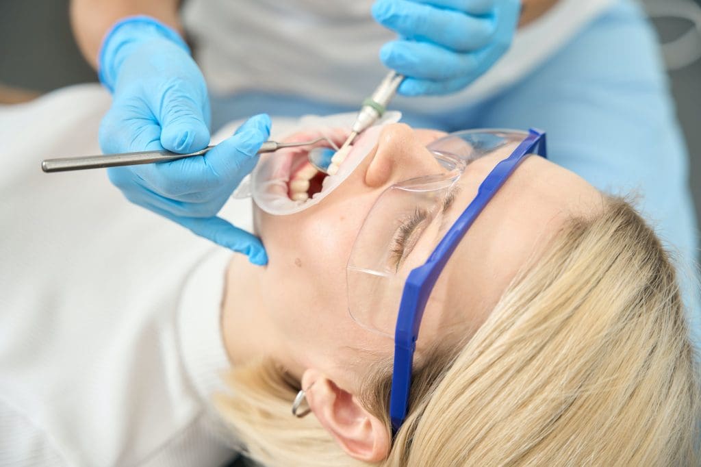Young woman undergoing dental and oral treatment